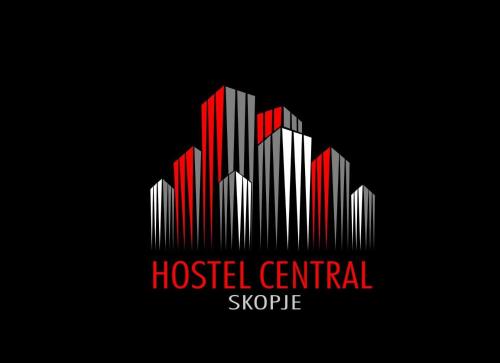 a white and red logo with the words hospital central syringe at Hostel Central Skopje in Skopje