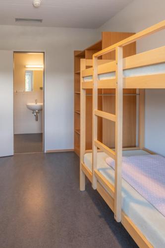 Cama o camas de una habitación en Valbella-Lenzerheide Youth Hostel