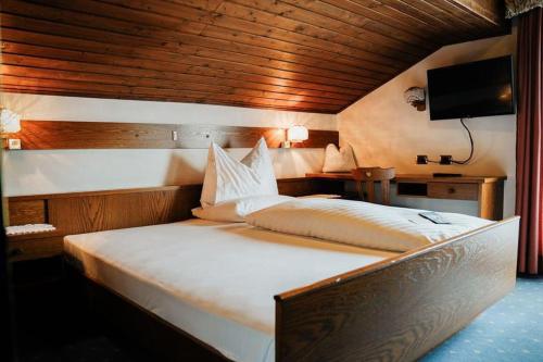 Кровать или кровати в номере Pension Panorama