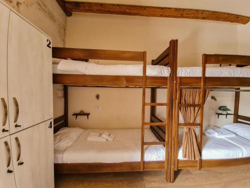 a bunk bed room with two bunk beds at Step to Kotor bay Guesthouse in Kotor