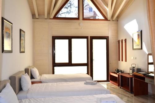Katil atau katil-katil dalam bilik di Tomce Sofka Apartments
