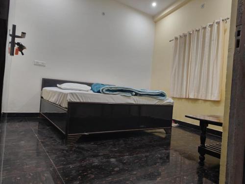Postel nebo postele na pokoji v ubytování Sky inn paying guest house