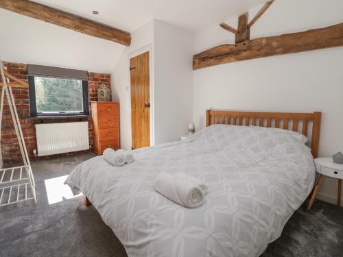 Postel nebo postele na pokoji v ubytování Lake View Barn