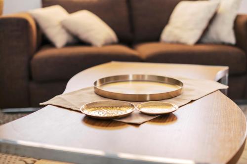two bowls on top of a table in a living room at Alonia View House in Asklipiḯon