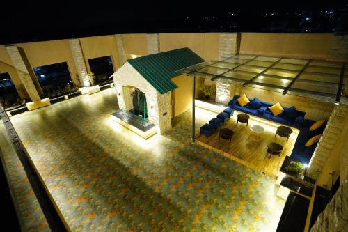 an aerial view of a building with a dog house at Hotel Classic Residency in Kālka
