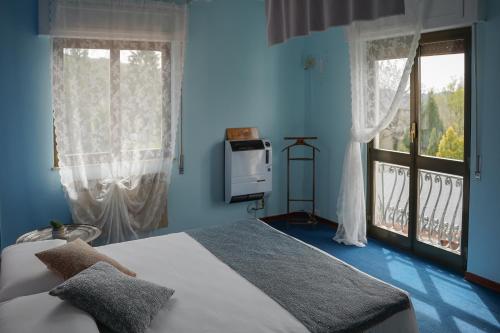 Postel nebo postele na pokoji v ubytování Casa Vicino