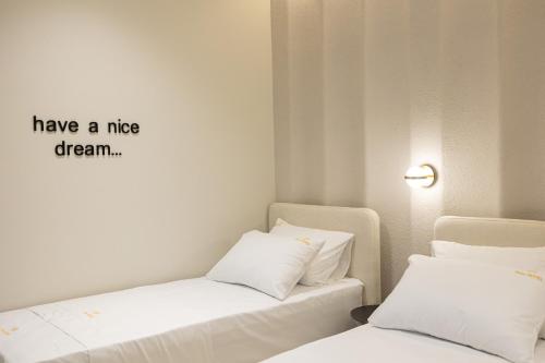 Cama o camas de una habitación en Hotel Beke