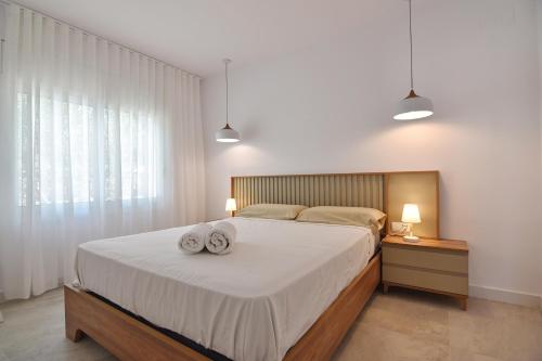 Katil atau katil-katil dalam bilik di Villa Montgo 2
