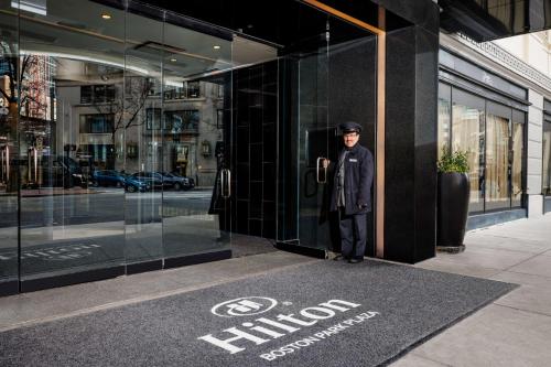 a man standing in the doorway of a building at Hilton Boston Park Plaza in Boston