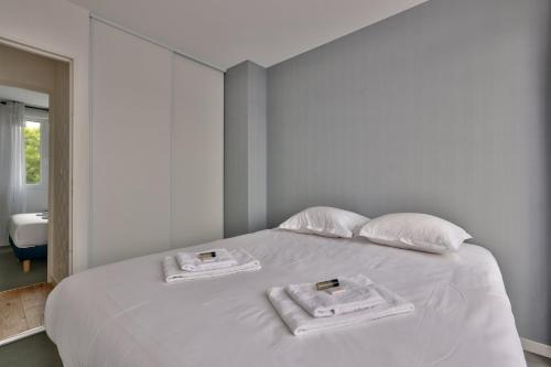 Postel nebo postele na pokoji v ubytování GuestReady - Le Dolce Vita em Lagord