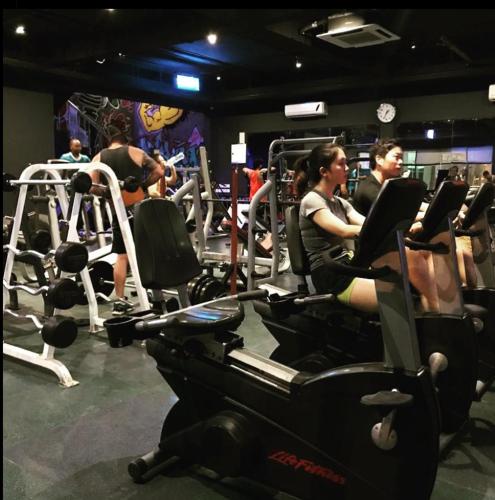 a group of people exercising in a gym at MAYFAIR in Dar es Salaam