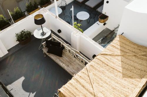 an overhead view of a balcony with a stage at Boutique Hotel Casa Cánovas in Cádiz