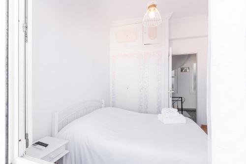 Postel nebo postele na pokoji v ubytování Syros DouBleTS Apartments