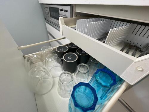 a drawer filled with glasses in a refrigerator at Twilight Villa Onjuku - Vacation STAY 52776v in Iwada