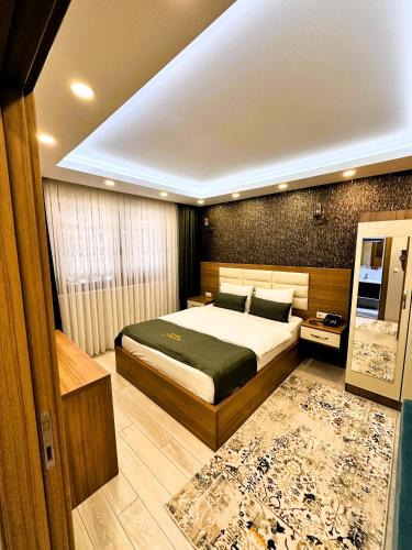 Katil atau katil-katil dalam bilik di Green Cinar Apart
