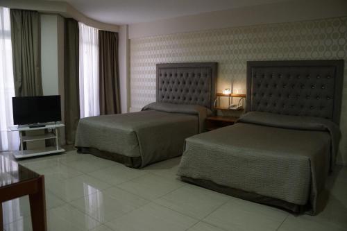 Katil atau katil-katil dalam bilik di Hotel Howard Johnson Rosario