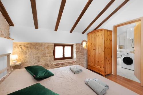 a bedroom with a large bed in a room at Villa Vrsar in Vrsar