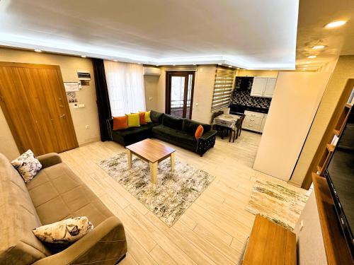 Ruang duduk di Green Cinar Apart