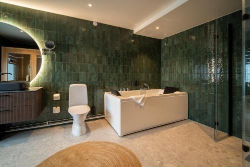 Un baño de Spar Hotel Gårda