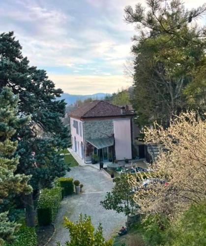 an aerial view of a house in a forest at Tenuta Moncarlino in Morsasco