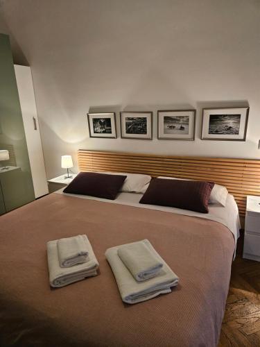 Postel nebo postele na pokoji v ubytování Appartamento Dante