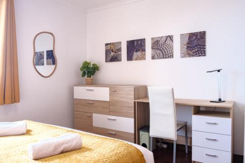 Postel nebo postele na pokoji v ubytování GuestReady - Tranquil Nest in Funchal