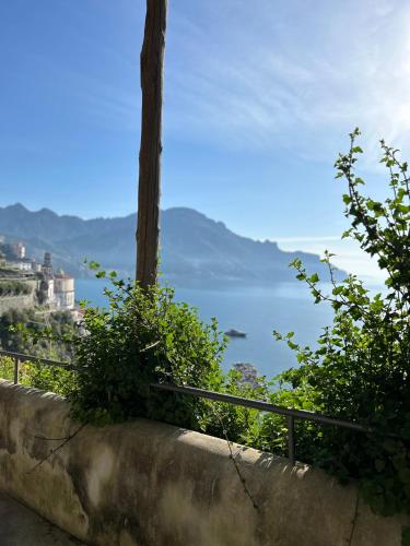 a view of a body of water from a hill at Amalfi Saracena House in Amalfi