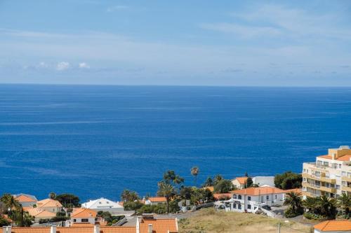 an aerial view of a city and the ocean at GuestReady - A splendid sea-view stay in Caniço