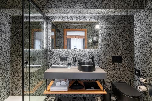 Koupelna v ubytování Aston Hotel Riga