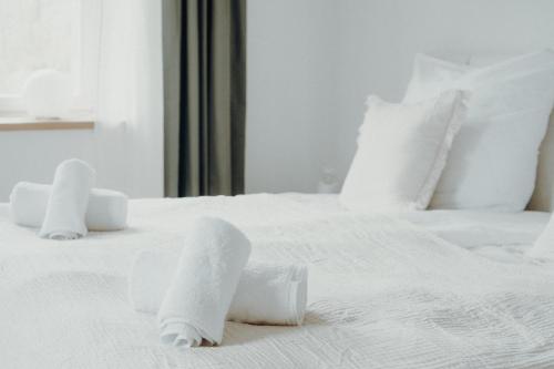 Weinstraßen Apartment mit Zentrumsanbindungにあるベッド