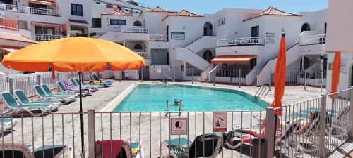 Swimmingpoolen hos eller tæt på Cozy and Confortable Flat into Quit Area