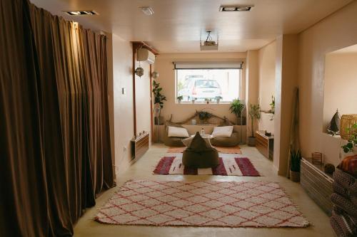 a hallway with a living room with a couch at Casa Africa in Tarifa