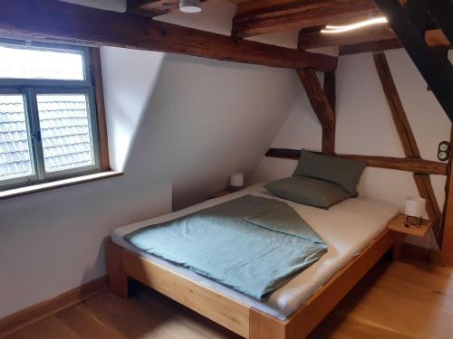 Postel nebo postele na pokoji v ubytování Ferienhaus an der Höh'