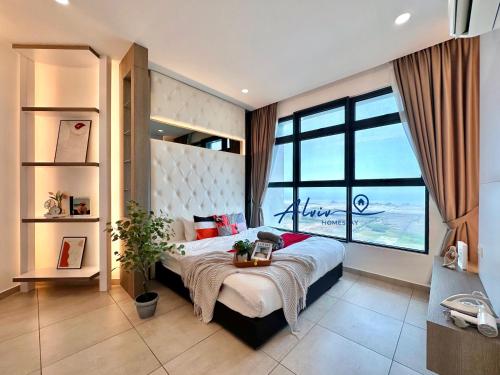 a bedroom with a large bed and a large window at Atlantis Melaka I 5-11pax I 5min JonkerSt by Alviv Management in Malacca