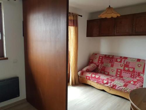 Ένα ή περισσότερα κρεβάτια σε δωμάτιο στο Studio Bettex Pierre Platte