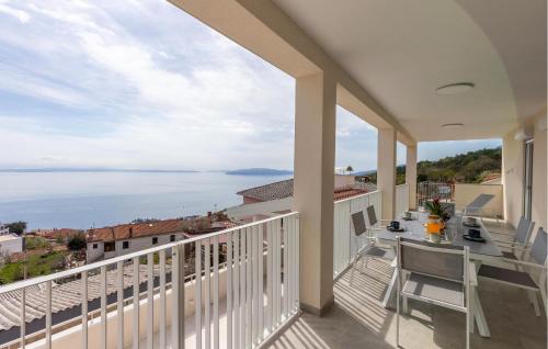 a balcony with a view of the ocean at Gorgeous Apartment In Bregi With Sauna in Breza