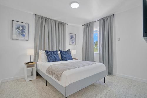 Postel nebo postele na pokoji v ubytování Stylish Wynwood Flats
