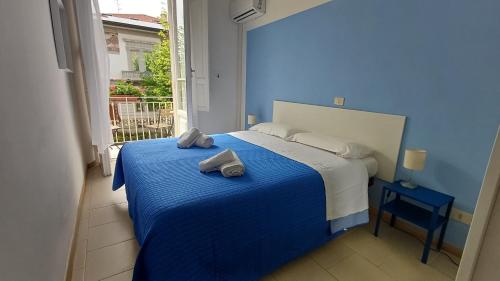 Postel nebo postele na pokoji v ubytování Hotel Canarco
