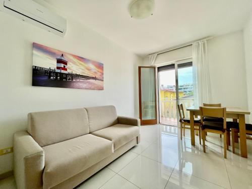 Ruang duduk di Appartamento Al Faro I TerraceRelax&Parking
