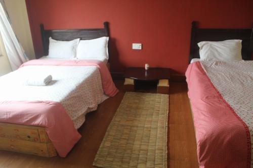 Cama o camas de una habitación en Hotel Holidays Inn - Bagpacker's Home