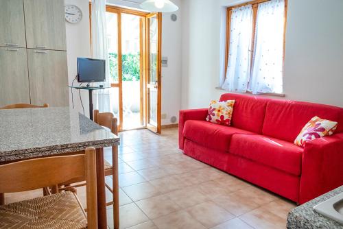 TV a/nebo společenská místnost v ubytování M370 - Marcelli, delizioso monolocale con terrazzo