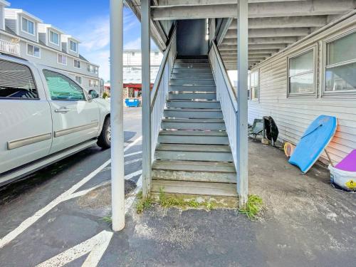 a stairway leading up to a building with a van at Sweet Serenity - Y846 condo in York