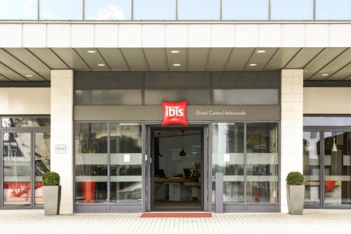 a building with a js sign on the front of it at ibis Bristol Centre in Bristol