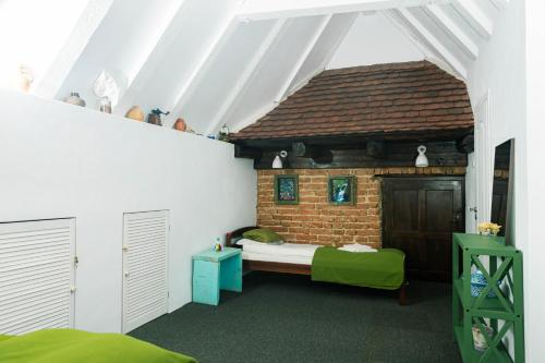 a room with a bed inside of a house at Casa Thea Cheile Nerei in Socolari