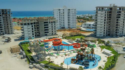 an aerial view of a water park with a roller coaster at Caesar Blue Resort & Spa 1+1 in Kalecik