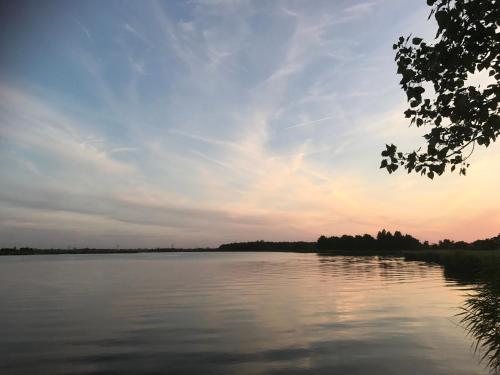 a view of a lake at sunset at Over Lake in Monnickendam