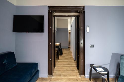 Et tv og/eller underholdning på RB Suites Napoli