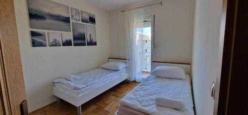 Ένα ή περισσότερα κρεβάτια σε δωμάτιο στο Regina Hungarorum