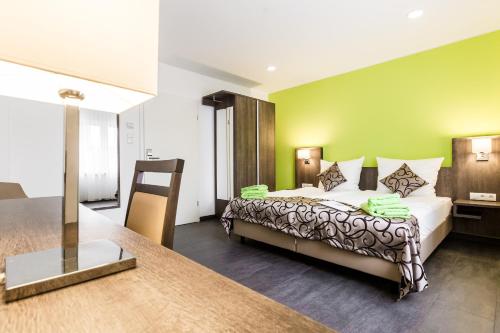 Llit o llits en una habitació de Zehnthof Apartment WH1 EG