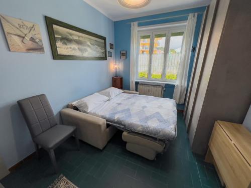 Ένα ή περισσότερα κρεβάτια σε δωμάτιο στο Casa Carlotta